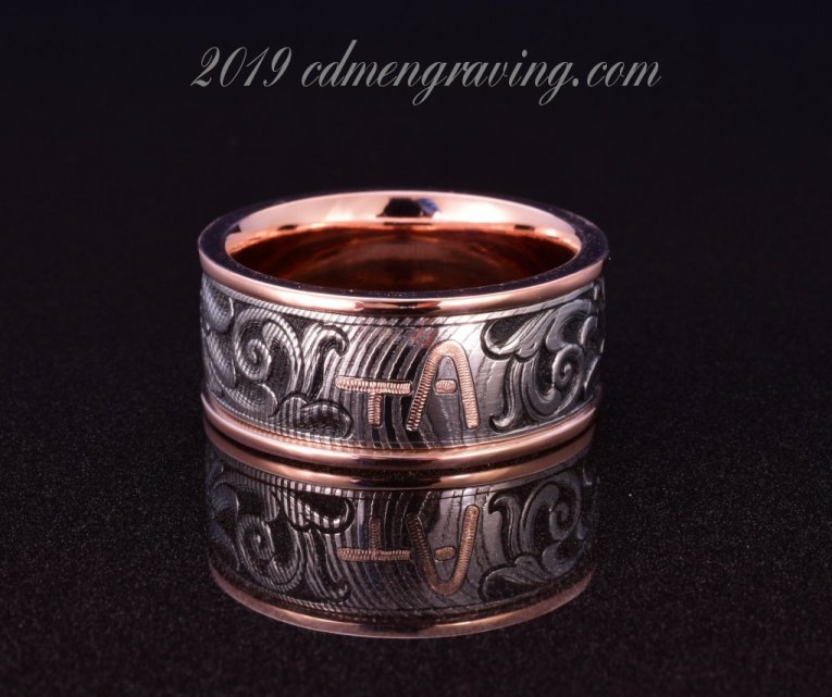 hand engraved rose gold + damascus cattle brand ring