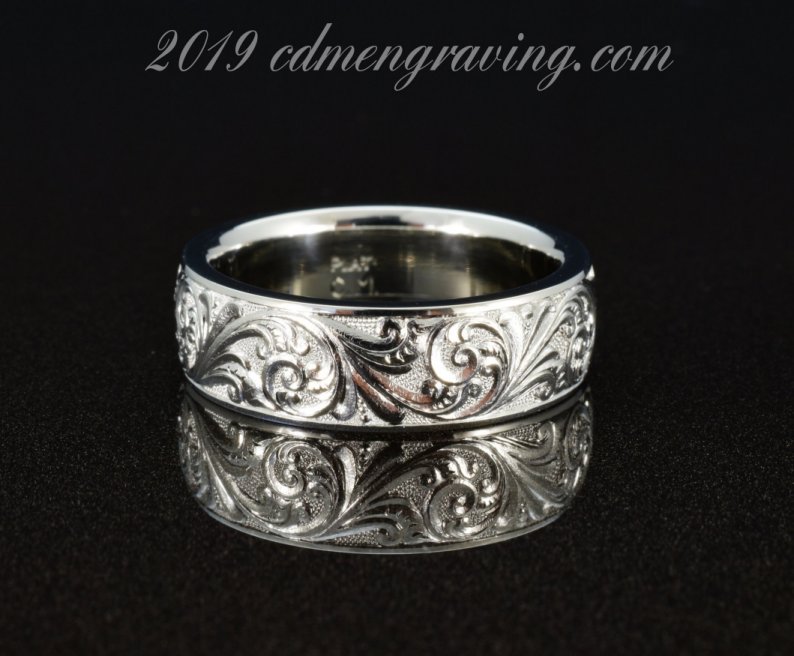Hand engraved platinum ring