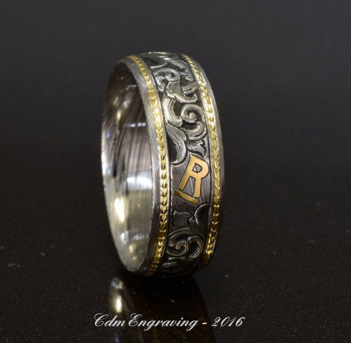 Hand engraved wedding band with cattle brand - damascus with 18k and 22k gold