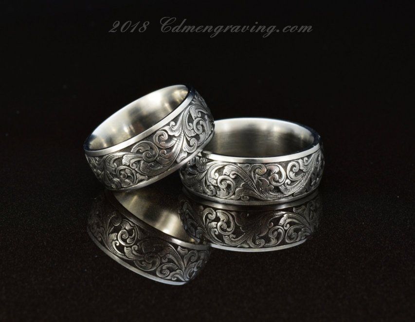 Traditional Hand Engraved matching ring pair in stainless. 
